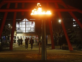 The Olympic cauldron lit up at the Olympic Oval in Calgary on Tuesday November 13, 2018.