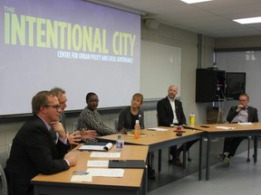 A panel discussion at the launch of Western University's Centre for Urban Policy and Local Governance on Friday included political scientists Martin Horak, left, and Neil Bradford, councillor-elect Arielle Kayabaga, Pillar Nonprofit Network's Michelle Baldwin, city planner John Fleming and University of Waterloo professor Pierre Filion. (Megan Stacey/The London Free Press)