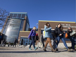 Students file out of Beal secondary school at the end of a school day. (File photo)