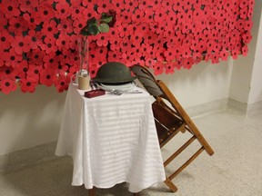 Longue Sault Public School set a table to honour fallen soldiers for Remembrance Day ceremonies. Lois Ann Baker/Cornwall Standard-Freeholder/Postmedia Network