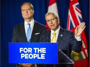 Ontario Fnance Minister Vic Fedeli (yellow tie) and President of the Treasury Board Peter Bethlenfalvy. Balancing Ontario's budget will not be an easy task.