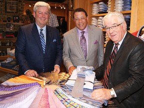 Bob Small (right), former long-time owner of Tyner-Shorten Clothiers, is retiring and his friend and associate Richard Melhado (centre) will take over the reins of the London store. Also shown is Rob Stacey.