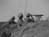 Canadians observing Germans near Cambrai, France in October 1918. (Library and Archives Canada)