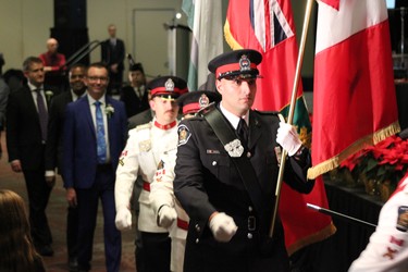 London Police Service Colour Guard led the new city council to the stage at the London Convention Centre for the formal swearing in ceremony on Dec. 3, 2018. (MEGAN STACEY/The London Free Press)