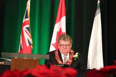 London's 64th Mayor Ed Holder sits down after receiving the chain of office from former MP Glen Pearson during the inaugural council meeting at the London Convention Centre on Dec. 3, 2018. (MEGAN STACEY/The London Free Press)