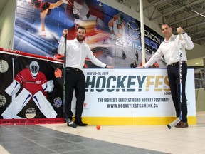 Former London Knights and NHL player Brandon Prust, left, and Brad Jones, president of Jones Entertainment Group, are seen at the Western Fair Sports Centre, one of five locations in Canada thus far where the London-based entertainment company will be hosting its Hockeyfest event. JONATHAN JUHA/THE LONDON FREE PRESS