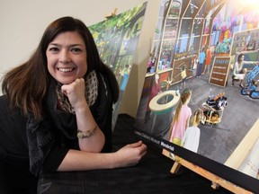 London Children's Museum executive director Amanda Conlon shows some of the renderings of its new home at the former Kellogg Plant, expected to open its doors in 2021. (JONATHAN JUHA, The London Free Press)