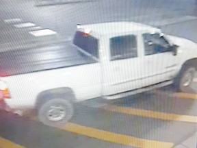 Oxford OPP are investigating the theft of an ATM from Sobey's Grocery Store on Broadway Street in Tillsonburg. Police said the suspected vehicle is an early 2000s crew cab pick-up truck that's white with a black tonneau cover and chrome side step bars. (Photo courtesy of Oxford OPP)