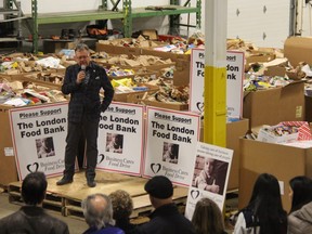 Business Cares Food Drive's chair Wayne Dunn speaks during the final event of the annual campaign, which wrapped up Friday, at JMP Solutions. JONATHAN JUHA/THE LONDON FREE PRESS