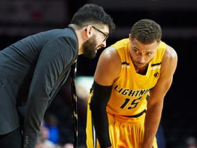 London Lightning head coach Elliott Etherington talks with Garrett Williamson during the 4th quarter of the Lightning's NBL game against the Kitchener Titans in London, Ontario, Friday,  December 21, 2018.
The London Free Press/ Geoff Robins