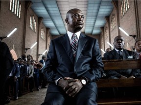 Official DRCongo Presidential candidate, Emmanuel Ramazani Shadary looks on inside the Cathedral Notre-Dame Du Congo in Kinshasa on November 24, 2018, during the launch of his official electoral campaign.