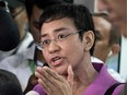 In this file photo taken on January 22, 2018 CEO of Philippine news website Rappler, Maria Ressa, speaks to the media at the National Bureau of Investigation (NBI) headquarters in Manila.