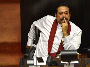 Sri Lankas former president Mahinda Rajapakse looks on during a parliament session in Colombo on December 18, 2018.