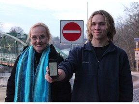 Erika Simpson and her son, Ben Langille, saw drivers heading the wrong way across Blackfriars Bridge this week. In at least one case, the direction came from a GPS device. (MEGAN STACEY/The London Free Press)