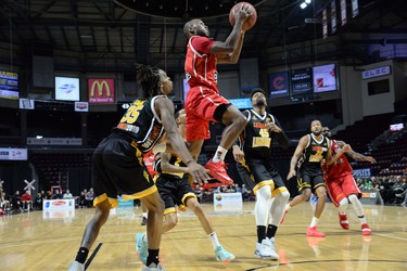 Windsor Express player Horace Wormely flies over the London Lightning defense to reach the net during their National Basketball League of Canada game in Windsor on Friday, Dec. 28, 2018. (TAYLOR CAMPBELL/Postmedia News)