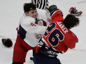 Stratford’s Kam Shearer and Kitchener’s Matt Marinier fight during a game in 2017-18 at the Allman Arena. Cory Smith/The Beacon Herald