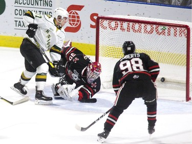London Knight Nathan Dunkley beats Niagara IceDogs goalie Stephen Dhillon in the first period of their game at Budweiser Gardens in London Friday.
Derek Ruttan/The London Free Press