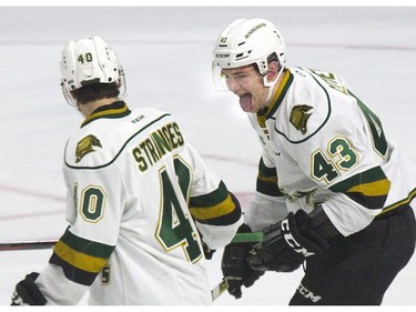 London Knights Antonio Stranges and Paul Cotter celebrate Nathan Dunkley's first-period goal against the Niagara IceDogs at Budweiser Gardens in London Friday. Stranges and Cotter assisted on the goal.  Derek Ruttan/The London Free Press