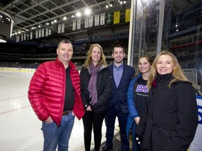 Rob Petrella, Wendy Blunt, Brendan Riggin, Andrea Petrella and Dawn Gill are working with the London Knights to get male junior hockey fans involved in a fitness regime.  (Mike Hensen/The London Free Press)