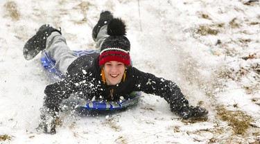 Logan Mitchell, 11 uses his hands to steer down the hill at Doidge Park on Sunday December 30, 2018. 
Mike Hensen/The London Free Press/Postmedia Network