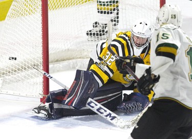 London Knights forward Cole Tymkin scores the team's seventh goal of the game against Sarnia Sting goalie Cameron Lamour during their OHL game in London, Ont. on Monday December 31, 2018. The Knights won the game 7-1. Derek Ruttan/The London Free Press/Postmedia Network