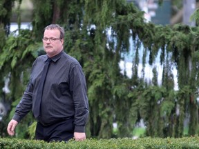 John Paul Stone walks toward the Perth County courthouse in Stratford earlier this year. (Postmedia file photo)