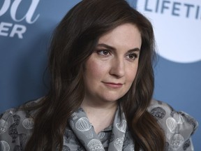 Lena Dunham arrives at The Hollywood Reporter's Women in Entertainment Breakfast at Milk Studios on Wednesday, Dec. 5, 2018, in Los Angeles.