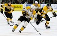 Sarnia Sting's Jamieson Rees (39) tries to outrace Kingston Frontenacs' Emmett Gordon (8) in the first period at Progressive Auto Sales Arena in Sarnia, Ont., on Saturday, Dec. 8, 2018. (Mark Malone/Chatham Daily News/Postmedia Network)