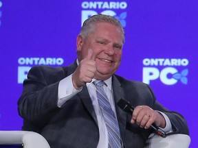 Toronto Sun Editor-in-chief Adrienne Batra holds a fireside chat with Premier Doug Ford during the Ontario PC Convention in Toronto, Ont. on Sunday November 18, 2018. (Dave Abel/Toronto Sun/Postmedia Network)