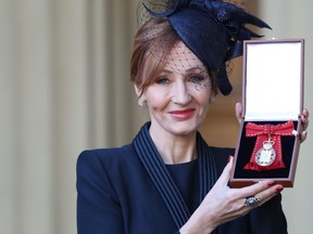 Harry Potter author J.K. Rowling is made a Companion of Honour by the Duke of Cambridge during an Investiture ceremony at Buckingham Palace.