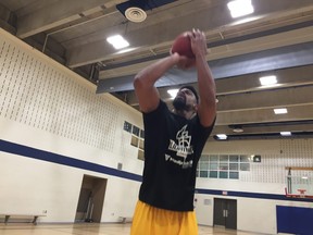 London Lightning power forward Marvin Phillips works on free throws after a London Lightning practice Tuesday at the London Central YMCA.
(Paul Vanderhoeven/The London Free Press)