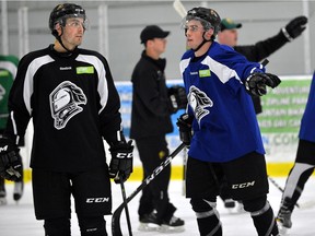 London Knights defenceman Evan Bouchard, left, and forward Liam Foudy during practice at the Western Fair Sports Centre. (Free Press file photo)