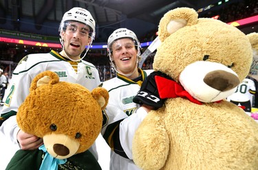 Knights captain Evan Bouchard and Adam Boqvist pose with some teddy bears after Boqvist scored late in the first period of their game unleashing the teddy bear toss during their game against the Sarnia Sting at Budweiser Gardens on Sunday December 2, 2018. 
Mike Hensen/The London Free Press/Postmedia Network