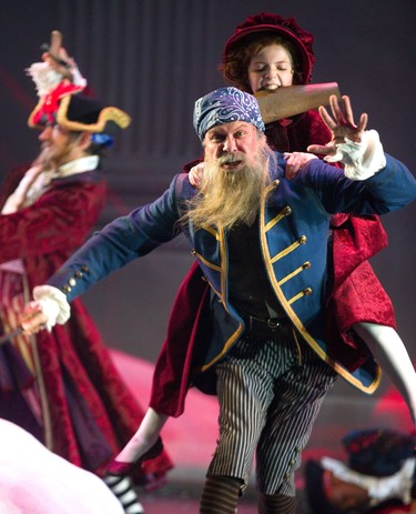 Riley DeLuca playing the youngest version of Scrooge in the the Grand Theatre's production of A Christmas Carol, has a fantasy battle with pirates from one of the books she read. Pirate played by Sean Arbuckle, Photograph taken on Wednesday December 5, 2018.  Mike Hensen/The London Free Press/Postmedia Network