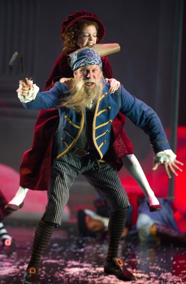 Riley DeLuca playing the youngest version of Scrooge in the the Grand Theatre's production of A Christmas Carol, has a fantasy battle with pirates from one of the books she read. Pirate played by Sean Arbuckle, Photograph taken on Wednesday December 5, 2018.  Mike Hensen/The London Free Press/Postmedia Network
