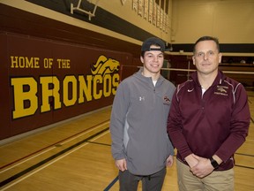 Banting football coach Todd MacKay and player Will Brown have started a campaign to raise funds for team member Josh Ruboneka whose family suffered devastating loses to a fire in their home. Photo shot in London, Ont. on Friday December 7, 2018. (Derek Ruttan/The London Free Press)