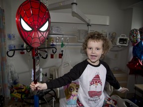 Six-year-old Hayden Foulon of London was exited to receive a new Spider-Man themed IV pole in her room at Children's Hospital in London.  Hayden is in the hospital fighting leukaemia. Through the Fight Like Mason Foundation, Chantelle Bacon and husband Iain Macri donated 40 custom designed IV poles to Children's Hospital. Their son Mason died from cancer at age four in 2016. (Derek Ruttan/The London Free Press)