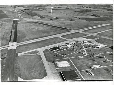 Extention of London Airport runway with London Flying Club buildings in foreground, 1973. (London Free Press files)