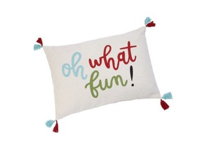 This undated photo shows a pillow available at Target. These Opalhouse toss pillows bring in some fresh, festive berry and candy hues to holiday décor. (Target via AP)