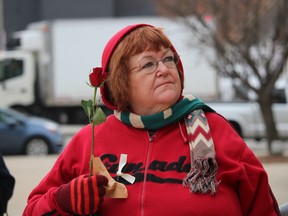 Retired engineer Janet Fisher listens Thursday outside Sarnia city hall during a National Day of Remembrance ceremony for the victims of the 1989 Montreal Massacre.