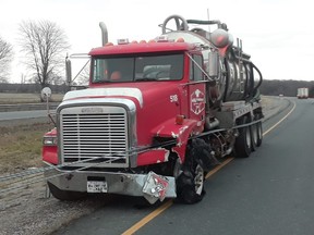 A commercial truck carrying flammable liquids crossed the centre median on Hwy. 401 near Downie Line. It was stopped from crossing into the eastbound lanes by the tension barriers. (Contributed photo)