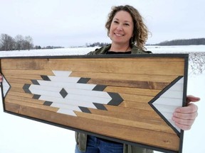 Leanne Garrett with husband Dwight own Farming Folks, creators of unique wood artwork which will be on display at the LHBA Lifestyle Homeshow this weekend.
CHRIS MONTANINI/POSTMEDIA NEWS