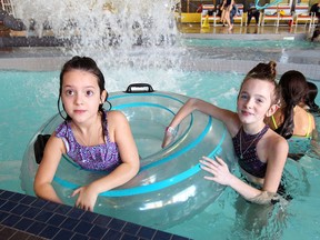 Windsor's Sophia Grenon, 6, left, enjoys Windsor's Adventure Bay Family Water Park with London's Ava Bright, 12, Saturday January 5, 2019. Both girls have a rare skin condition called vitiligo and it was Sophia's first time meeting someone else with vitiligo.