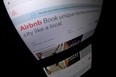 (FILES) This file photo taken on March 2, 2017 shows the logo of online lodging service Airbnb