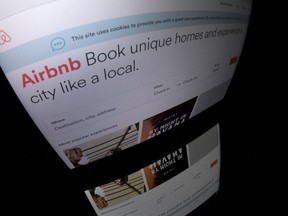 This file photo shows the logo of online lodging service Airbnb