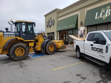A vehicle struck an LCBO near the intersection of Clarke Road and Dundas Street on Tuesday, January 1, 2019.  (EDGE Contracting photo)