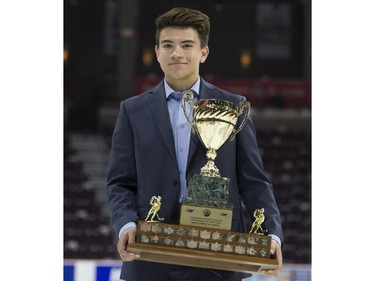 CHL Sportsman of the Year Award recipient Nick Suzuki, from the Owen Sound Attack, holds his trophy following a media availability at the Memorial Cup Saturday May 27, 2017 in Windsor.