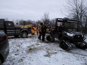 A photo taken by police shows the search for a vehicle that plunged into the South Saugeen River Saturday. The vehicle was found Monday, with no occupants inside, but a man who is believed to have been the driver was found dead on the riverbank.