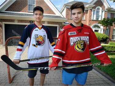 Ryan Suzuki, left, and his big brother Nick in the driveway of their family home in Byron on Thursday June 15, 2017. (Free Press file photo)