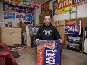 Ward 2 Coun. Shawn Lewis has a garage filled with elections signs, which he plans to re-use in the next election campaign, as well as a collection of others he has kept for many years. Lewis spent close to the maximum allowed to defeat 24-year council veteran Bill Armstrong. (Derek Ruttan/The London Free Press)